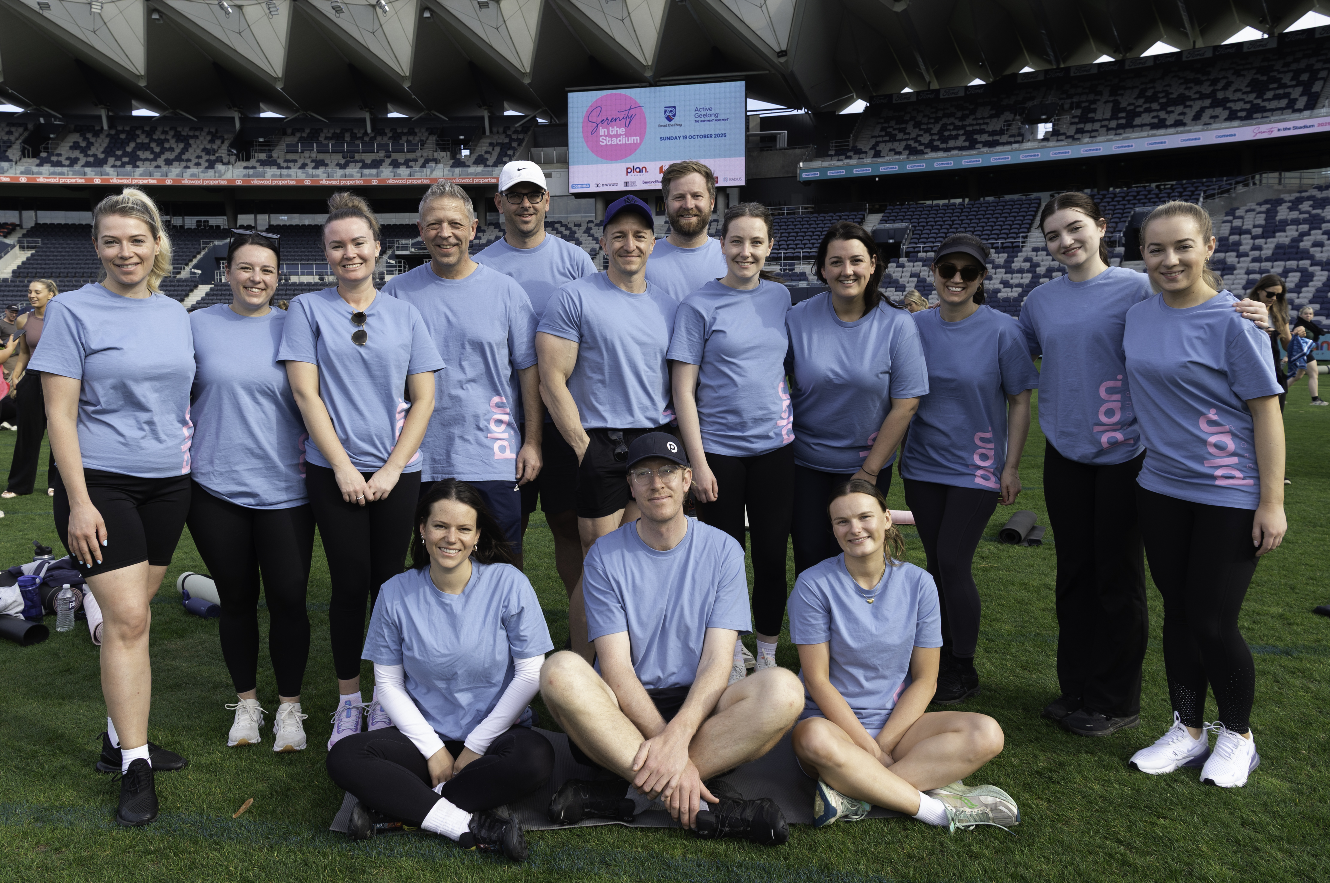 A workplace team together on the field